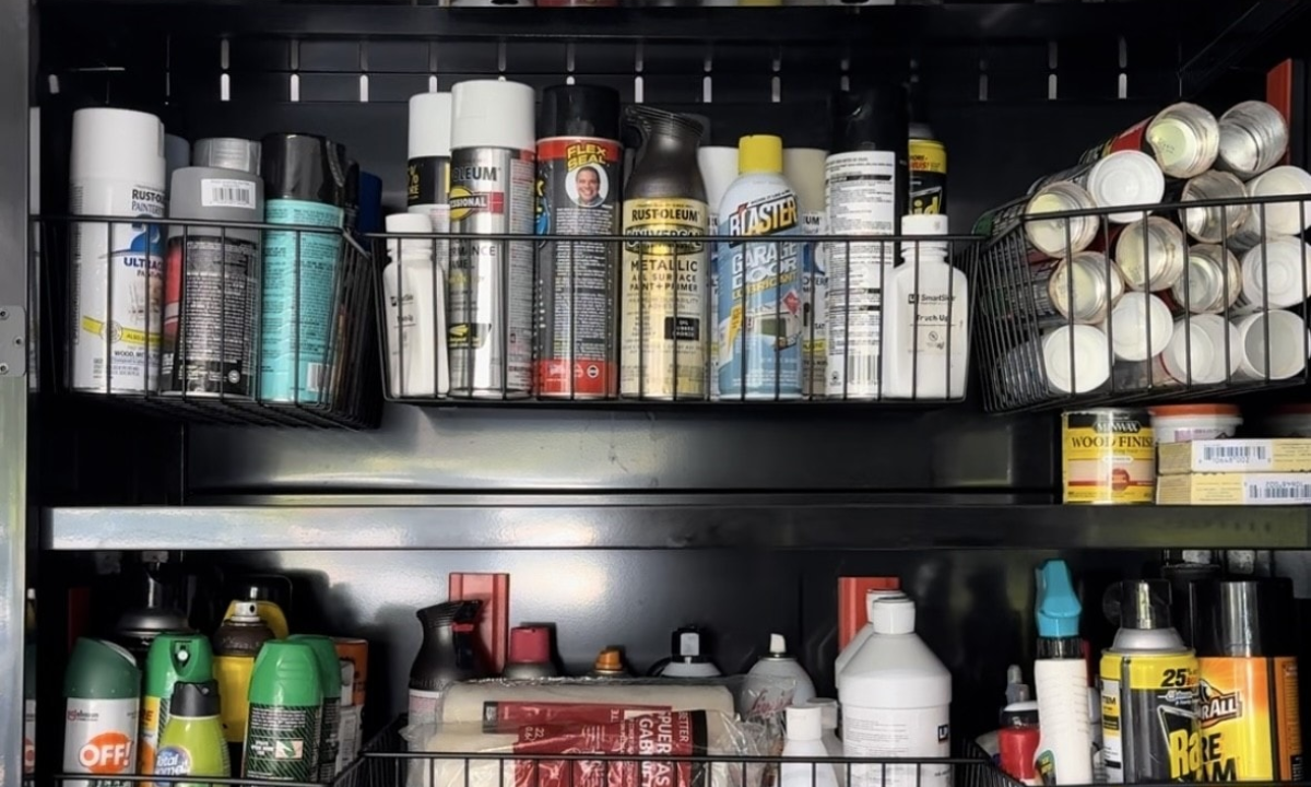 Gator magnetic baskets organize aerosol cans, wood finish and workshop supplies on a steel cabinet.