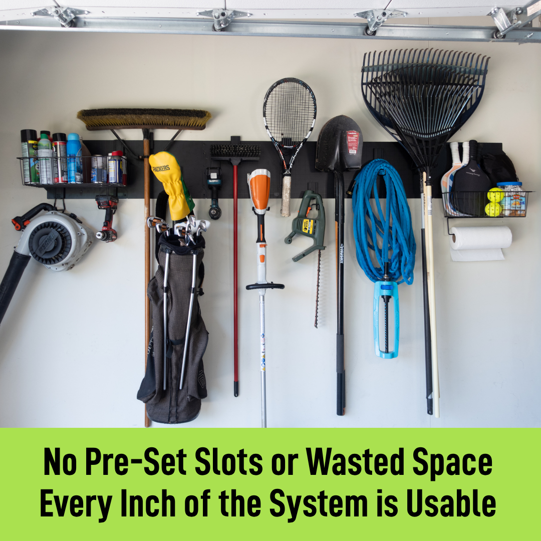 Black magnetic wall storage system organizing rakes, brooms, tools, hoses and baskets.