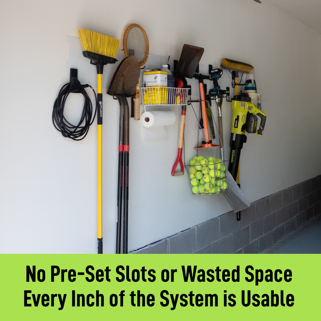 White 100-inch magnetic wall storage system organizing yard tools, baskets and a ladder.