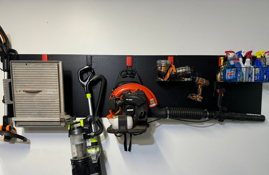 Magnetic Hooks hanging heavy tools. These magnetic hooks are hanging a leaf blower, vacuum, table saw, and cleaning supplies! The most flexible storage solution on the market for keeping your heavy tools off of the ground.