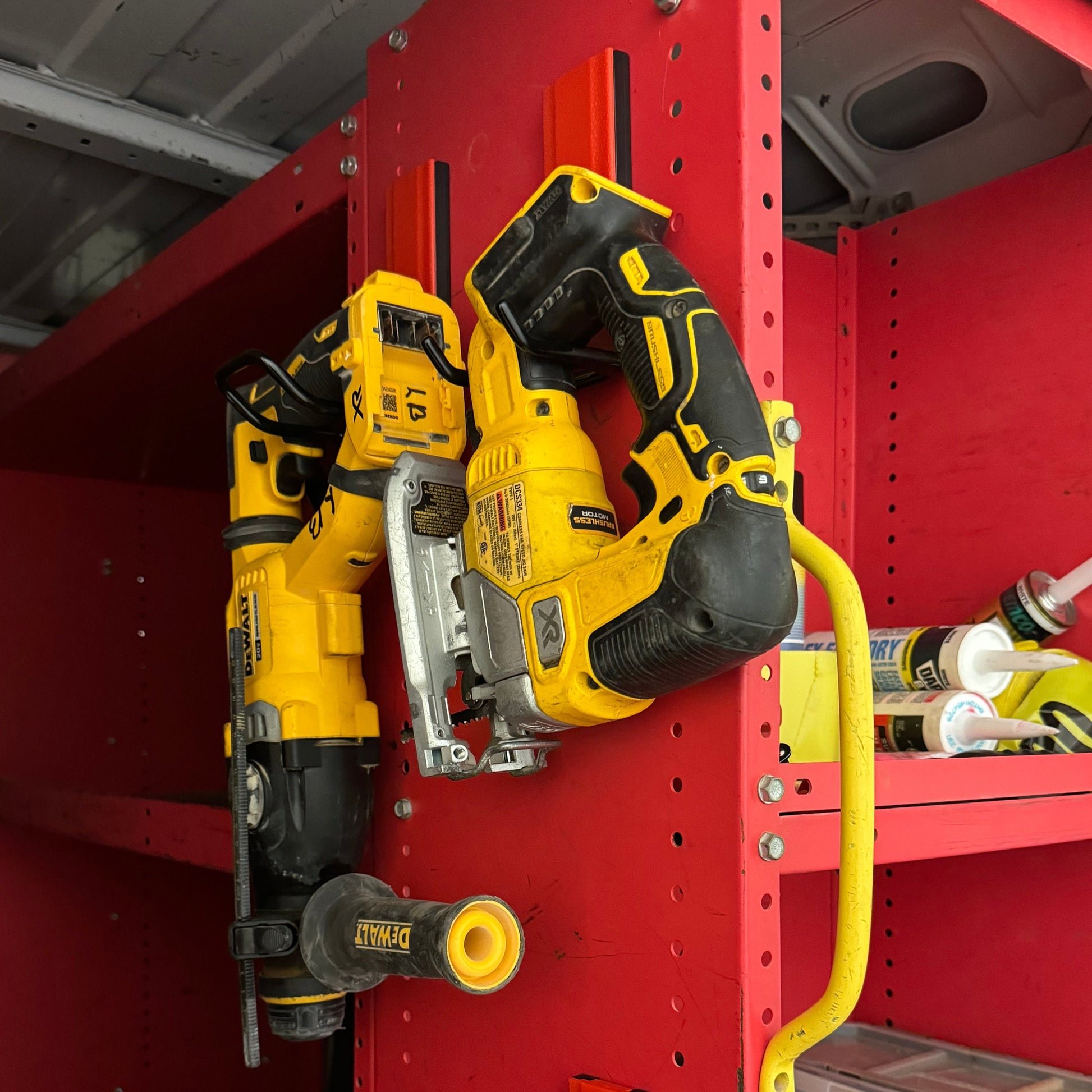 These heavy duty magnetic hooks can be seen organizing hand tools. These magnetic wall organizers are perfect for garage storage.