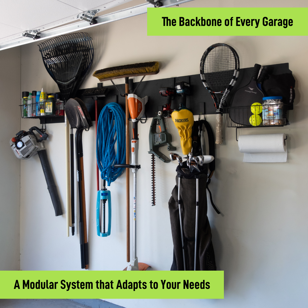 Black magnetic garage storage system organizing rakes, tools, hoses, baskets and sports gear.